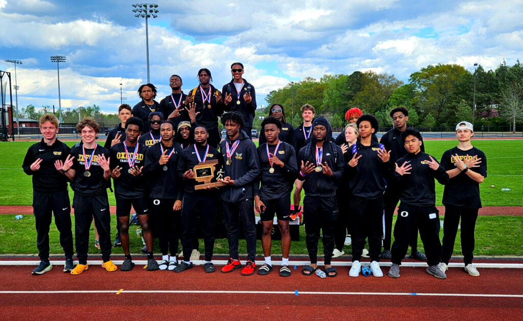 Oxford’s boys made it seven Calhoun County titles in a row Wednesday at Choccolocco Park. (Photo by Joe Medley)