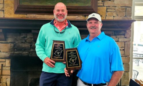 With Ty Cole standing on the Silver Lakes hearth base next to taller friend and teammate Gary Wigington on Sunday, the two celebrate their victory in the 2024 Calhoun County Team Championship. (Photo by Joe Medley)